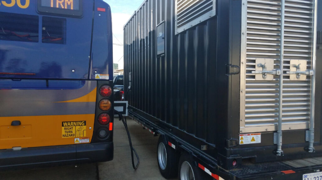 Hybrid charging system charging a transit bus' electric battery